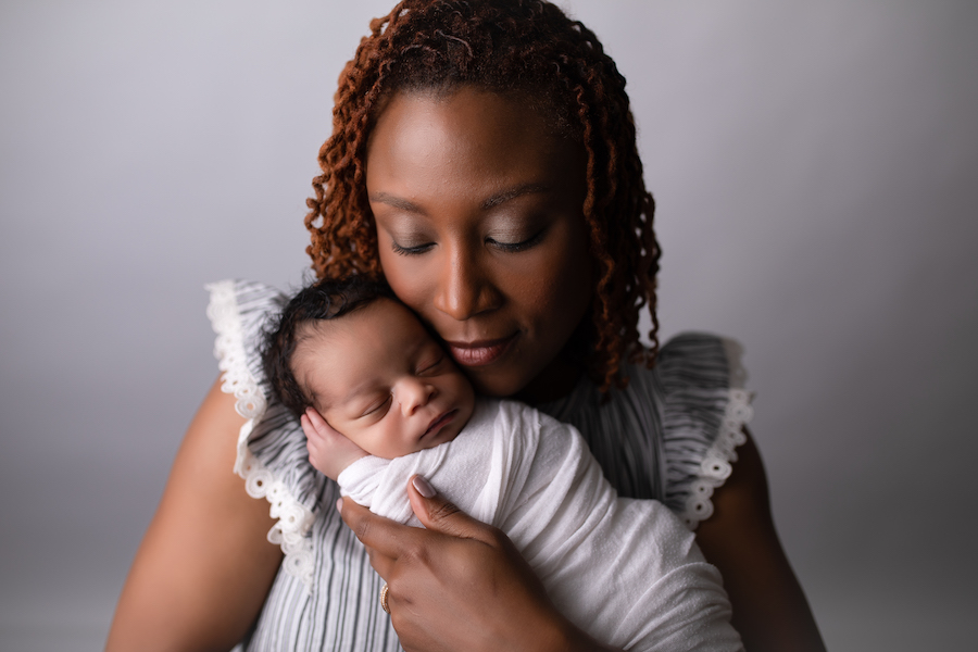 Mom holding newborn