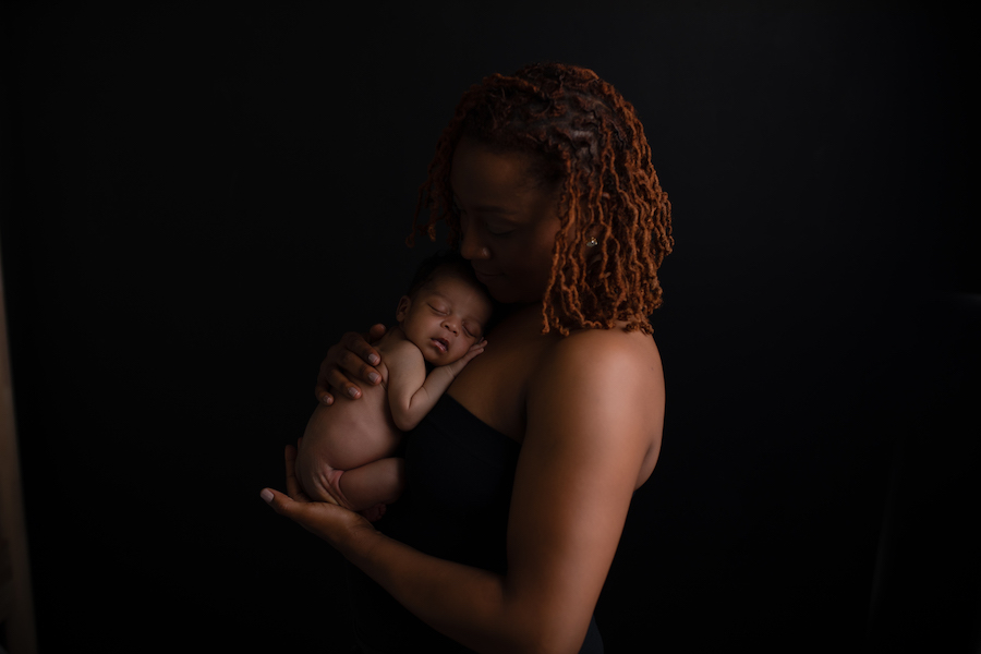 Mom holding newborn