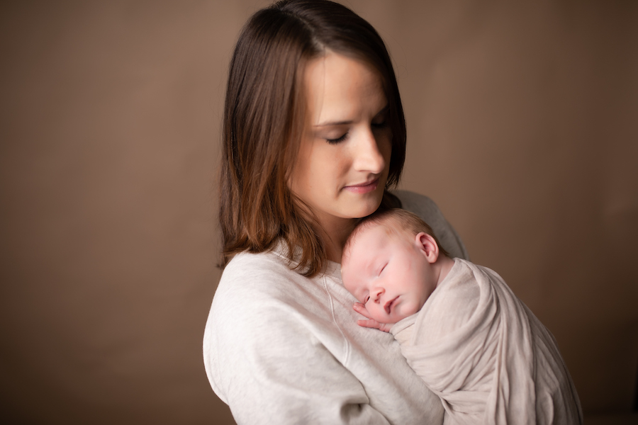 Mom holding newborn