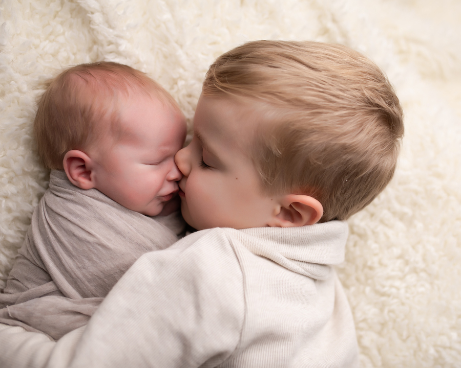 Siblings Snuggling