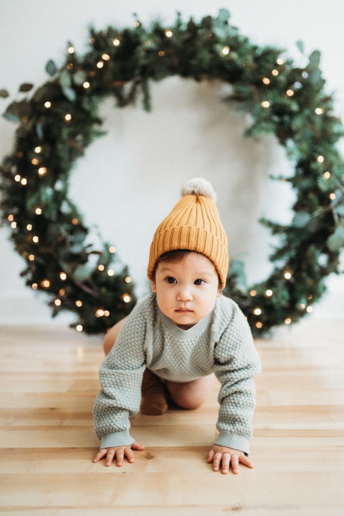 Baby Girl with large wreath holiday portrait